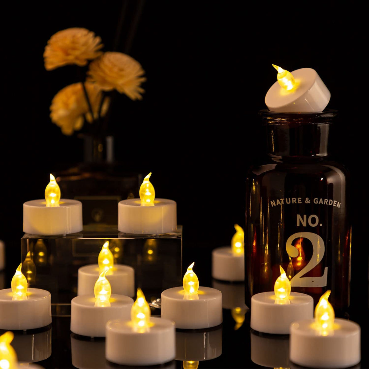 Hanzim Battery Tea Lights, 50 Pack LED Tea Light Candles 100 Hours Realistic Flickering Bulb Battery Operated Tea Lights for Seasonal Festival Celebration Electric Fake Candle in Warm Yellow